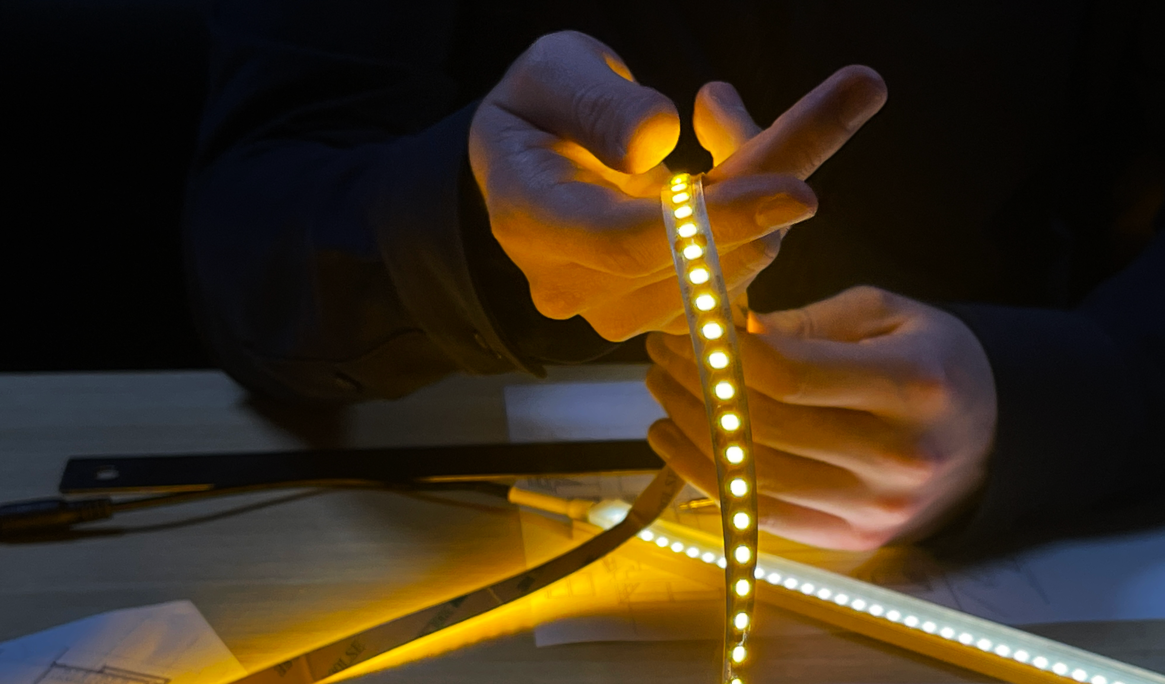 hand holding an LED Strip Light - Marketing Photo 